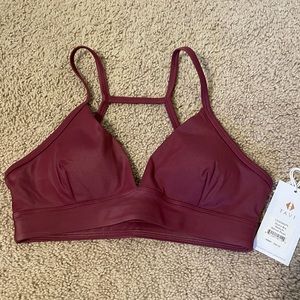 Tavi Noir Sports Bra - BNWT - garnet pearl color